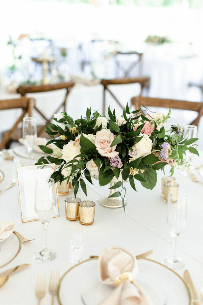 Simple soft blooms to complete gold table settings.